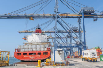 A port in Cartagena Colombia receives shipping containers as supply chains continue to shift creating challenges and opportunities.