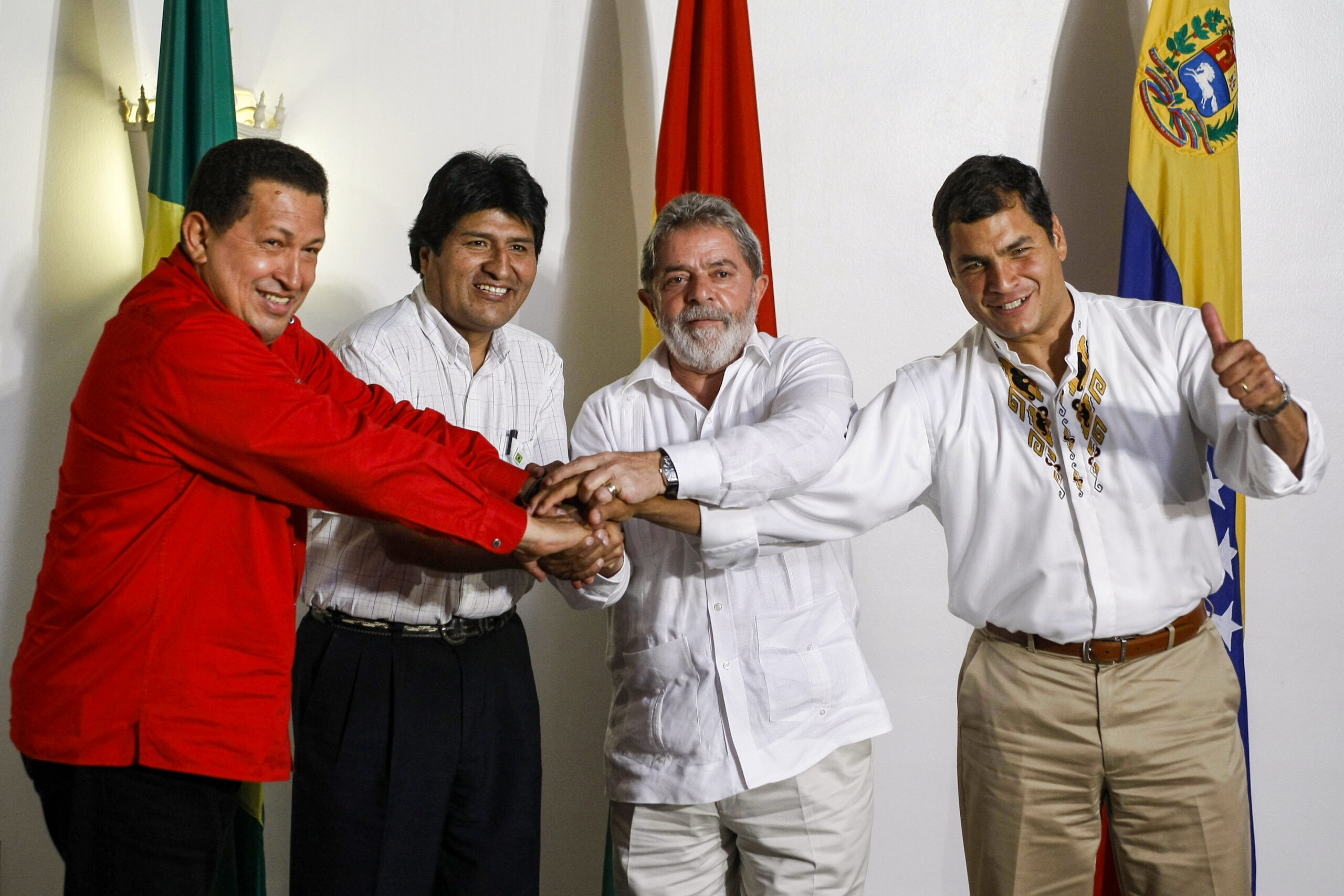 Pink Tide Presidents Hugo Chávez, Evo Morales, Luiz Inácio Lula da Silva and Rafael Correa join hands in 2008.