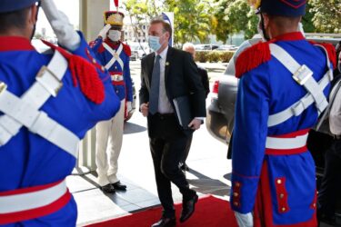 White House official Jake Sullivan greeted by Brazils ceremonial guard.