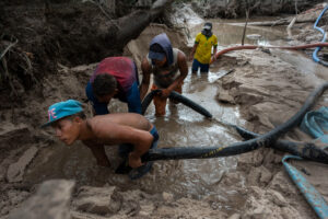 Miners search for gold in the Venezuelan Amazon at the edge of Canaima National Park, once a haven for ecotourism.