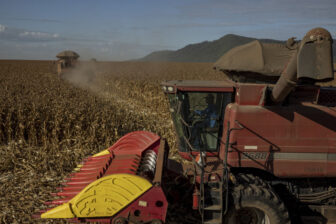 Workers operate combine harvesters during a corn harvest at a farm in Santana do Araguaia, Para state, Brazil, on Wednesday, June 22, 2022. Agriculture increased its share of Brazilian gross domestic product over the past three years from 20% to 28% of the countrys $1.7 trillion economy, according to the University of Sao Paulo. Photographer: Victor Moriyama/Bloomberg via Getty Images