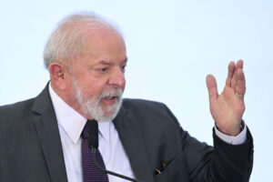 Brazilian President Luiz Inacio Lula da Silva gestures as he delivers a speech during the launch of the 'Mais Médicos' program, which aims to increase the supply of medical care in deprived and isolated regions, at the Planalto Palace in Brasilia, March 20, 2023. (Photo by EVARISTO SA / AFP) (Photo by EVARISTO SA/AFP via Getty Images)