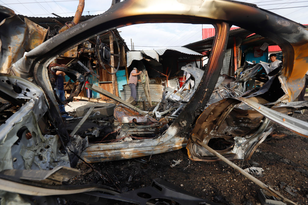 GUAYAQUIL, ECUADOR - APRIL 25: Wreckege of a car after a suspected car bomb exploded this morning outside "La Roca" prison on April 25, 2022 in Guayaquil, Ecuador. The cause of the explision is under investigation. (Photo by Mariana Miller/Agencia Press South/Getty Images)