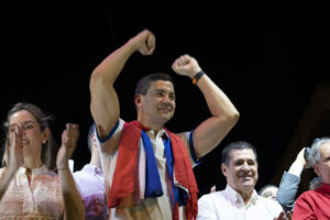 ASUNCION, PARAGUAY - APRIL 30: Paraguayan presidential candidate for the Colorado Party, Santiago Pena (C), his wife Leticia Ocampos de Pea (L) and the Paraguayan former President, Horacio Cartes (R) celebrate after winning the presidential elections in Asuncion, Paraguay on April 30, 2023. (Photo by Mayeli Villalba/Anadolu Agency via Getty Images)