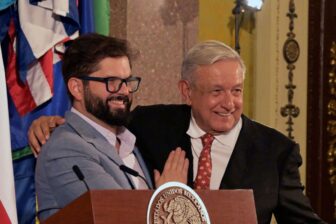 Mexican President Andres Manuel Lopez Obrador (R) and his Chilean counterpart Gabriel Boric greet each other during a press conference at the Presidential Palace in Mexico City, on November 23, 2022. (Photo by RODRIGO ARANGUA / AFP) (Photo by RODRIGO ARANGUA/AFP via Getty Images)