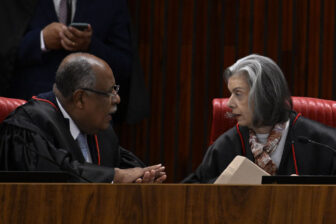 Supreme Electoral Court Justice Benedito Goncalves, left, speaks with Supreme Federal Court President Cármen Lúcia Antunes Rocha in court in Brasilia in June at the trial of former President Jair Bolsonaro.