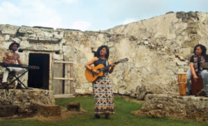 Kaomi, the Panamanian trio, performs “Me dijo bella” in Portobelo, Panama.