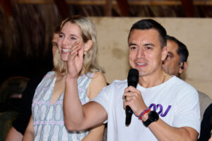 SANTA ELENA, ECUADOR - OCTOBER 15: Newly elected President of Ecuador Daniel Noboa of Acción Nacional Democrática coalition (R) speaks next to his wife Lavinia Valbonesi (L) after winning the presidential runoff at Olon coast on October 15, 2023 in Santa Elena, Ecuador. According to official results, Daniel Noboa of Accion Democratica Nacional has 52,28% of the votes and Luisa Gonzalez of Revolucion Ciudadana has 47,72%, with 91,05 of the voting counted. Noboa will complete the 2021-2025 period after President Guillermo Lasso applied the "cross death" to dissolve parliament a call for early elections. (Photo by Franklin Jacome/Getty Images)