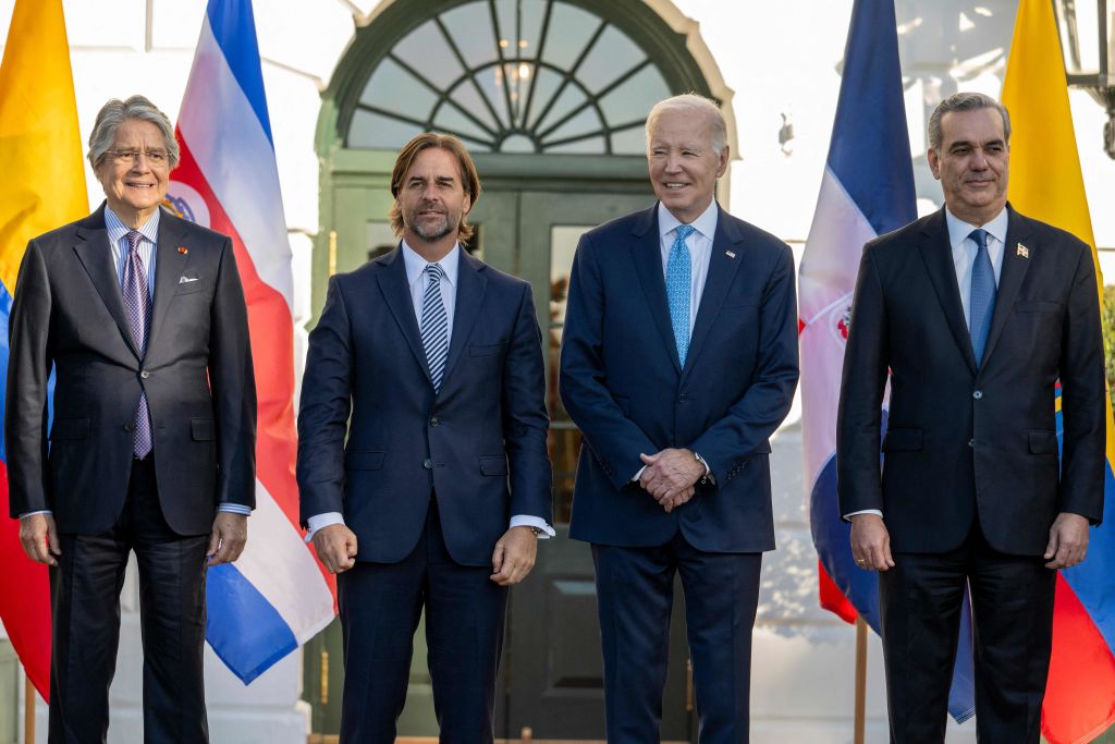 U.S. President Joe Biden stands with Dominican Republic President Luis Abinader, Uruguayan President Luis Lacalle Pou and Ecuadoran President Guillermo Lasso at the White House in Washington, DC, on November 3, 2023, at the inaugural Americas Partnership for Economic Prosperity Leaders' Summit meant to boost U.S. investment in Latin America and counter China's growing influence in the region.