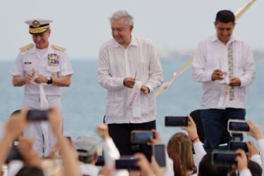 President of Mexico Andres Manuel Lopez Obrador (center), Secretary of the Navy Jose Rafael Ojeda Duran (left), and Governor of the State of Oaxaca Salomon Jara Cruz (right) are attending the inauguration ceremony of the breakwater at the Port of Salina Cruz, Oaxaca. The breakwater has been constructed to foster the development of the southeast region and enhance international trade by leveraging the country's geographical benefits.