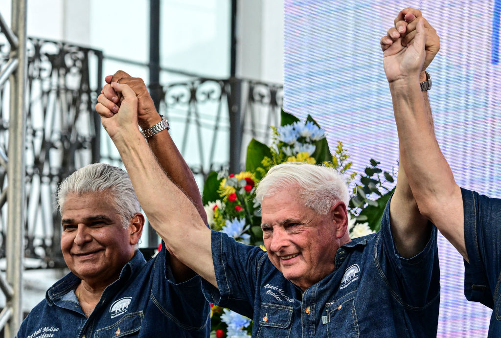 Former Panamanian president and presidential candidate Ricardo Martinelli (R) and vice-presidential candidate Jose Raul Mulino participate in a political rally in Panama City on February 3, 2024. Martinelli kicked off his campaign for the May 5 presidential election on Saturday at a rally with thousands of supporters, a day after his candidacy was put at risk by an unappealable court ruling.