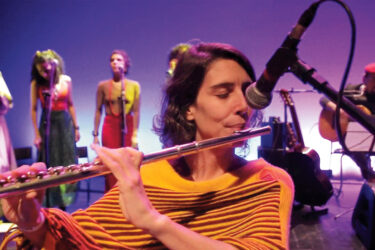 Orquestra Mundana Refugi performing their song “Taranta” from their album Todo lugar é aqui