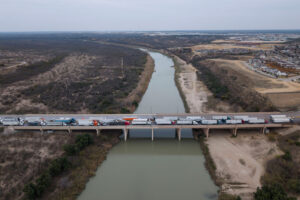Trucks in line to enter the U.S. at the Laredo, Texas port of entry in February. What Cartel FTO Designation May Mean for Mexico: Companies can take steps right now to mitigate the risks.