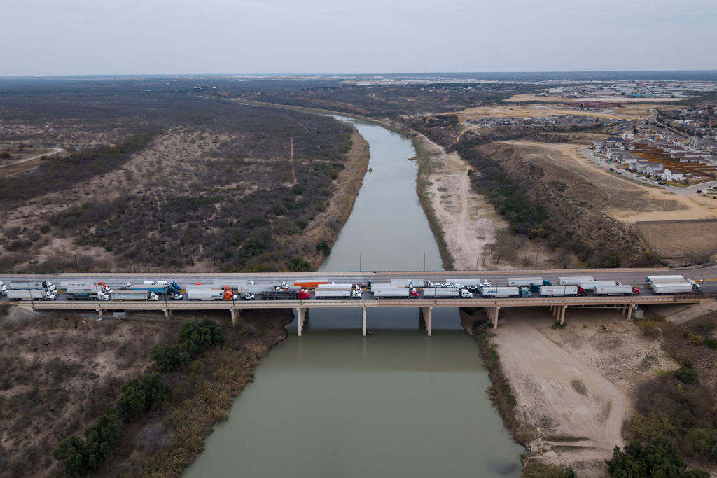 Trucks in line to enter the U.S. at the Laredo, Texas port of entry in February. What Cartel FTO Designation May Mean for Mexico: Companies can take steps right now to mitigate the risks.