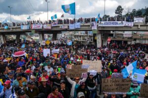 Protesters block a highway in Totonicapán, Guatemala, in October 2023 after Indigenous leaders called for national demonstrations.