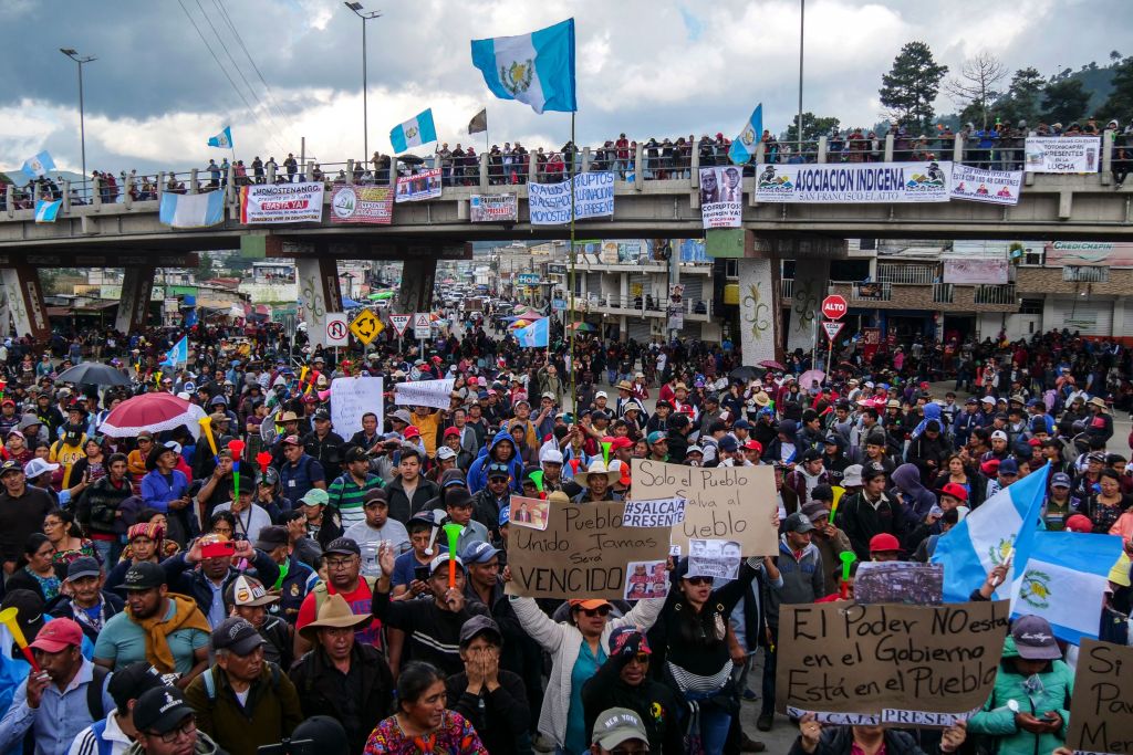Protesters block a highway in Totonicapán, Guatemala, in October 2023 after Indigenous leaders called for national demonstrations.