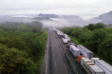 Hundreds of trucks stand stranded by highway blockades in Panama's Veraguas Province on May 14.