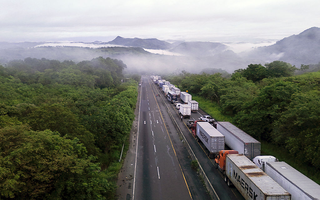 Hundreds of trucks stand stranded by highway blockades in Panama's Veraguas Province on May 14.