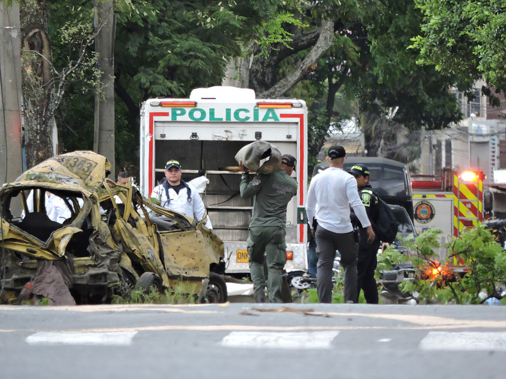 Explosives left six dead and more than 60 wounded outside an airbase in Cali, Colombia, on August 21.