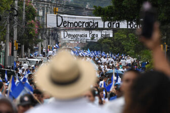 Supporters of the opposition National Party march in Tegucigalpa in July.