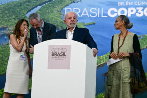 Brazil's President Luiz Inacio Lula da Silva speaks alongside Environment Minister Marina Silva. at the COP30 UN Climate Change Conference in Belem, Brazil, on November 19, 2025.
