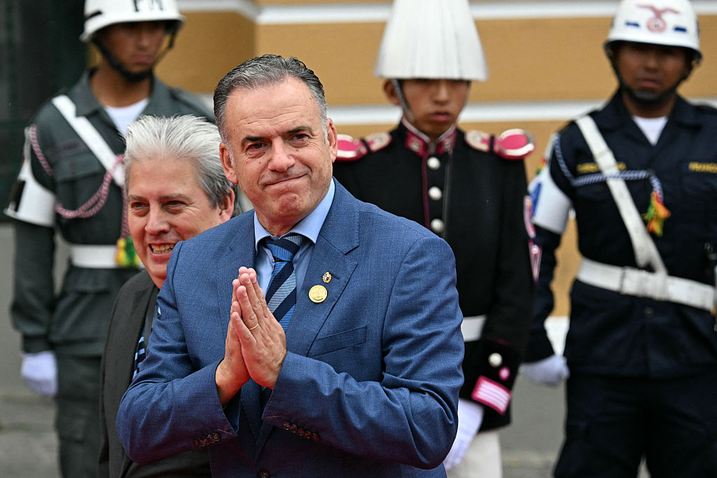 Uruguay's President Yamandú Orsi gestures upon arrival at the Murillo Square for the inauguration ceremony of Bolivia's president-elect Rodrigo Paz in La Paz on November 8, 2025. (Photo by AIZAR RALDES / AFP) (Photo by AIZAR RALDES/AFP via Getty Images)