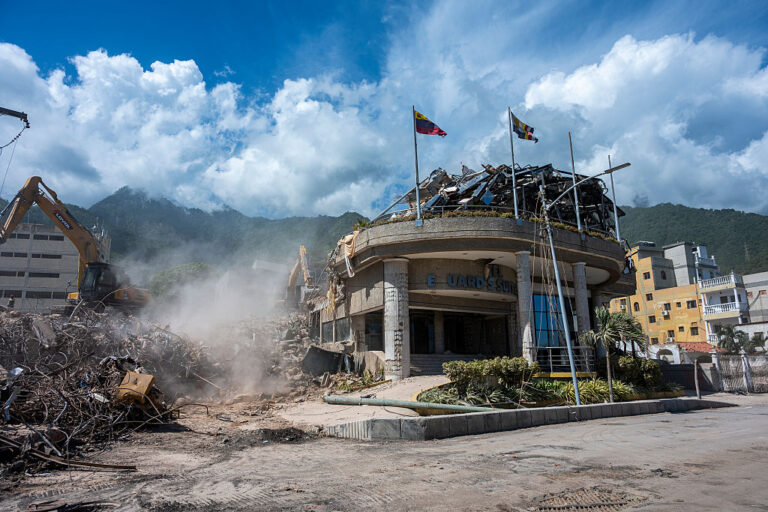 Part of a hotel entrance remains standing after the building collapsed on July 8 following the earthquakes that struck La Guaira, Venezuela, on June 24