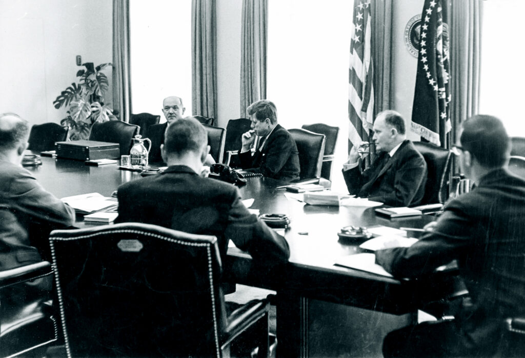U.S. President John F. Kennedy holds emergency talks at the White House in September 1962.