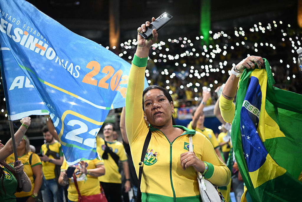 Supporters of Senator Flávio Bolsonaro attend a campaign rally in Rio de Janeiro, Brazil, on August 22.