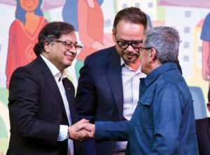 Former President Gustavo Petro (L) meets with ELN commander Pablo Beltrán during negotiations in Bogotá in 2023.