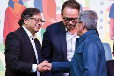 Former President Gustavo Petro (L) meets with ELN commander Pablo Beltrán during negotiations in Bogotá in 2023.